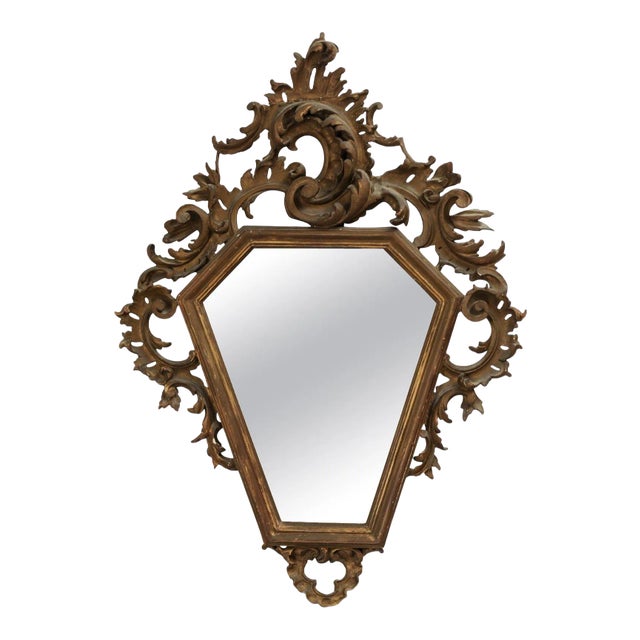 Italian 19th Century Rococo Style Carved Mirror with Traces of Gilt and Scrolls For Sale