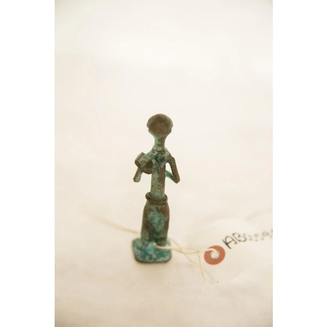 :: Vintage handmade African Oxidized Copper Male Farmer. Circa mid 20th century and possibly older, this piece has such...