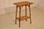 Late 19th century tortoise bamboo side table from France. The top is surrounded by a band of bamboo molding. The table is...