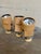 This set of 3 directional spot lights features industrial cylindrical shades with adjustable pivoting mounts. Vintage...