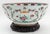 Chinese Export Famille Rose Porcelain Large Punch Bowl, with hand-painted floral motif and carved wood stand. Bowl: 6.25"...