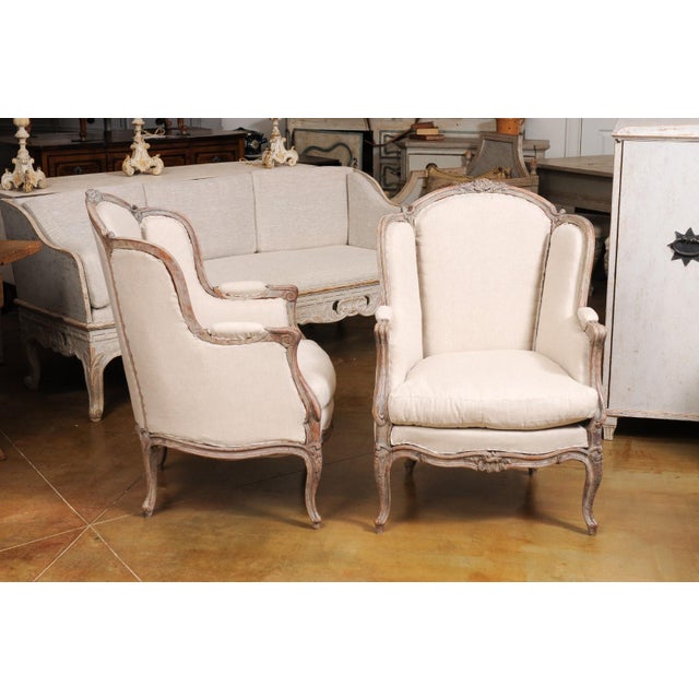 French Louis XV Style 1880s Painted Bergère Chairs with Carved Floral Motifs - A Pair For Sale - Image 4 of 12