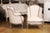 French Louis XV Style 1880s Painted Bergère Chairs with Carved Floral Motifs - A Pair For Sale - Image 4 of 12