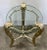 Timeless Caracole Baroque Style Champagne Silver Finished Accent Table, wood base, glass top, showroom floor sample