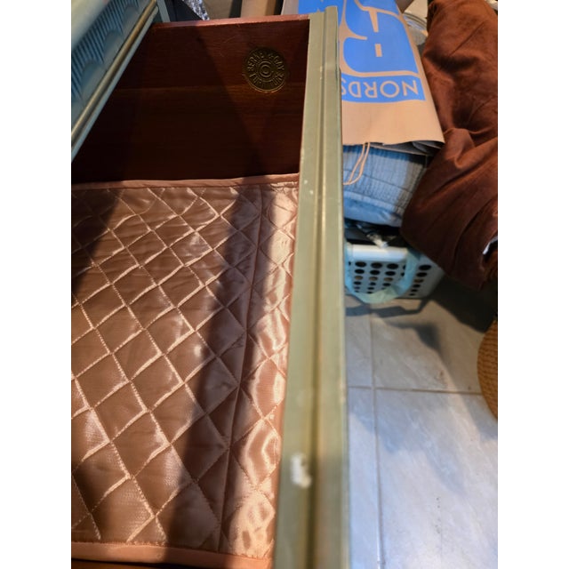 These are gently antique dressers. One dresser has a broken wooden decorative piece, but the piece is included for easy...