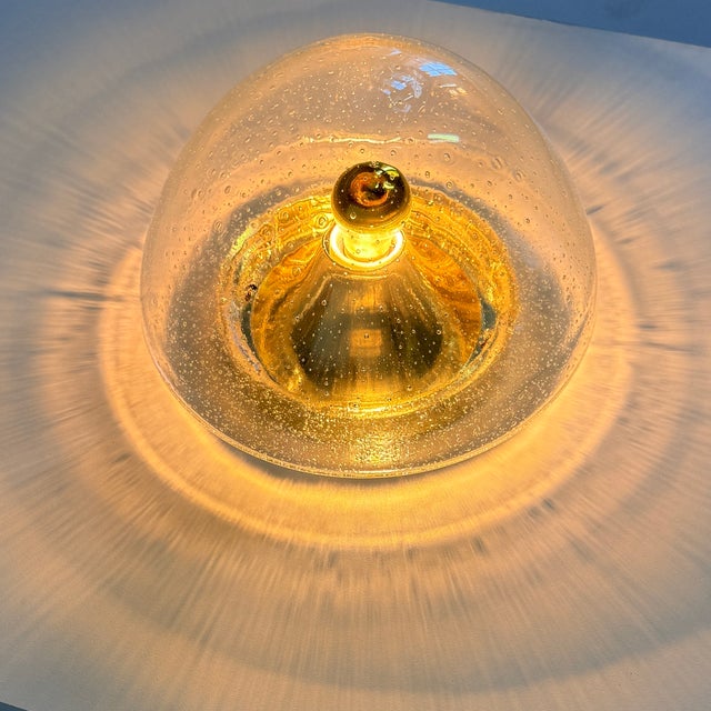 Mid-century lamp from the german company hoffmeister from the 1970s. The lamp can be mounted on both the wall and ceiling...