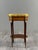 An elegant louis xvi style mahogany side table, featuring a circular top surrounded by an openwork gallery of gilt brass....