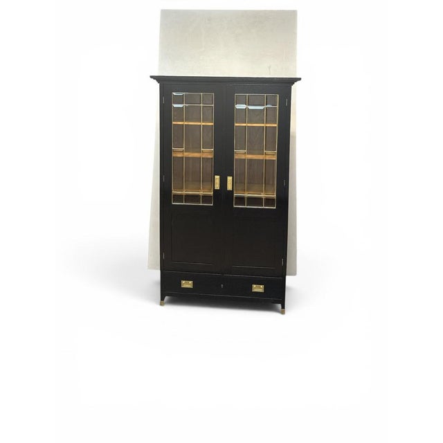 Original bookcase circa 1910 (No. 2610) Wood type: Oak Color: Black stained, hand-polished with shellac Dimensions:...