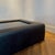 Modern Upholstered Leather Coffee Table with Black Glass Top, 2014 For Sale - Image 10 of 11