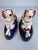 A charming pair of Staffordshire dogs with a bit of utility as a pen holder. The dogs rest atop a cobalt colored base with...