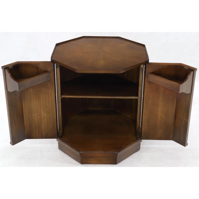 Mid-Century Modern walnut gallery edges octagon shape two-door cabinet stand.