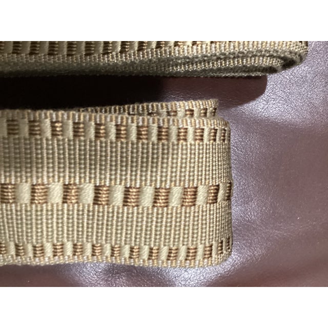 Border flat trim 2"" Two pieces measuring 1st piece measures 2''x115'' more that 3 yards and other pieces is 2''x105...