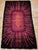 36” x 63” Wonderful and colorful mid century modern Rya area rug in crimson, red, pink, and brown colors. Dimensions: 36”...