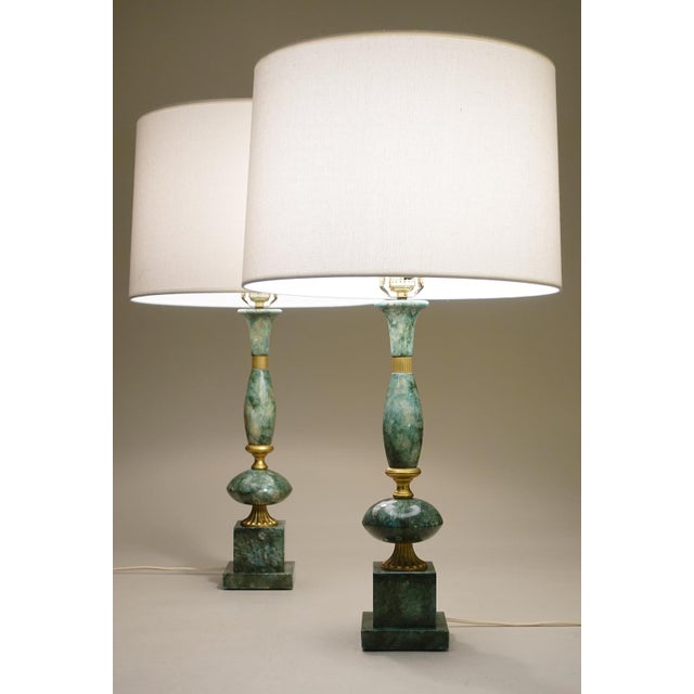 A striking matching set of Italian Malachite marble Classic Hollywood Regency Urn style Column table lamps from Italy...