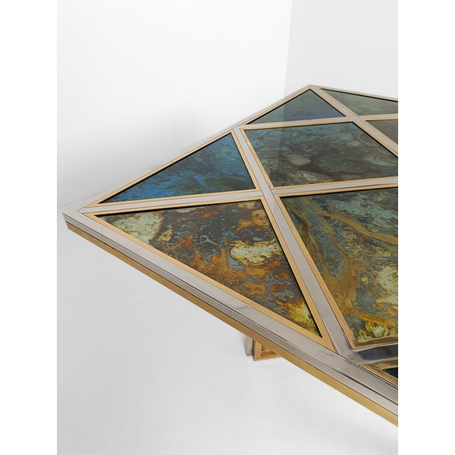 We offer for sale a stunning Center Table, made in Italy during the 70s by Romeo Rega, as attested by the signature...