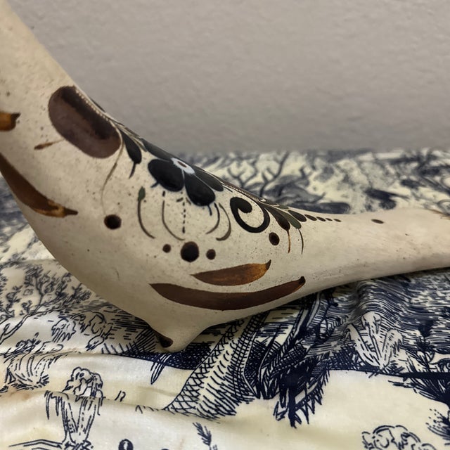 A vibrant Mexican Tonalá pottery bird handcrafted in the traditional style of folk art ceramics from Jalisco, Mexico. This...