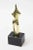 This small fabulous vintage signed polished bronze sculpture of a female form in some abstraction. It sits on a black...