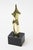 This small fabulous vintage signed polished bronze sculpture of a female form in some abstraction. It sits on a black...