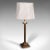 This is a vintage table lamp. An English, brass desk or side light with ecclesiastical taste, dating to the late 20th...