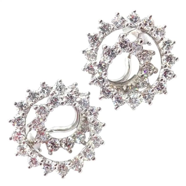 A rare and elegant vintage creation from Tiffany & Co., these Irid Platinum Earrings showcase a captivating sculptural...
