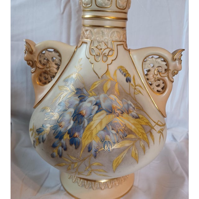 Antique Royal Worcester porcelain vase made in England around the 1800's. Beautifully hand Painted. There Is A small chip...