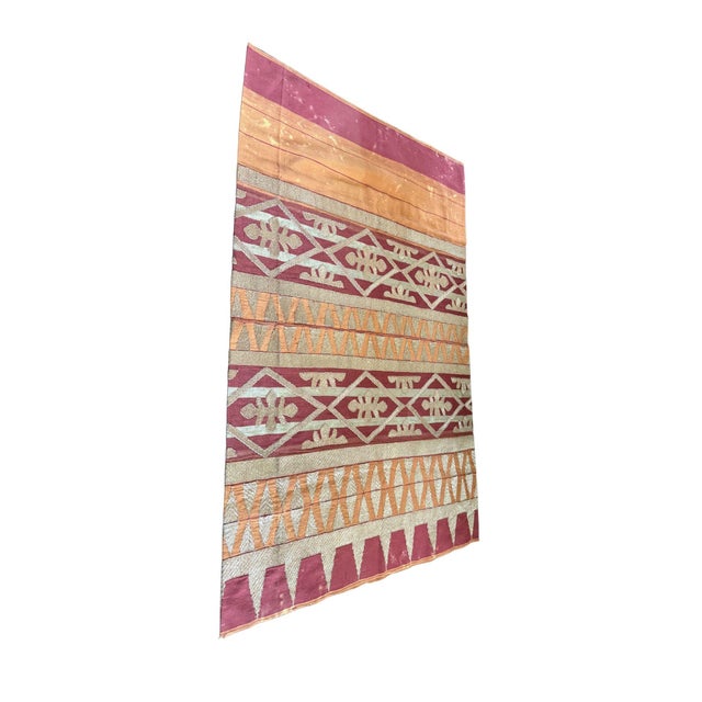 This Palembang songket sarong from South Sumatra is a striking example of mid-20th century ceremonial weaving. Woven as a...