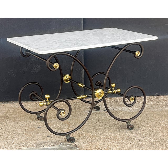 A fine French bakery patisserie or pastry maker's table from the Belle Époque era, featuring a rectangular figured white...