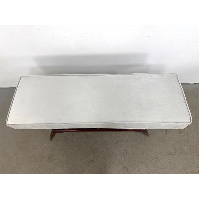 Elegant Gio Ponti–style mid-century modern bench featuring a beautifully proportioned upholstered seat elevated on a...
