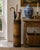 A charming late 19th century wood and iron tall bucket or umbrella stand with a warm, timeworn surface and beautifully...