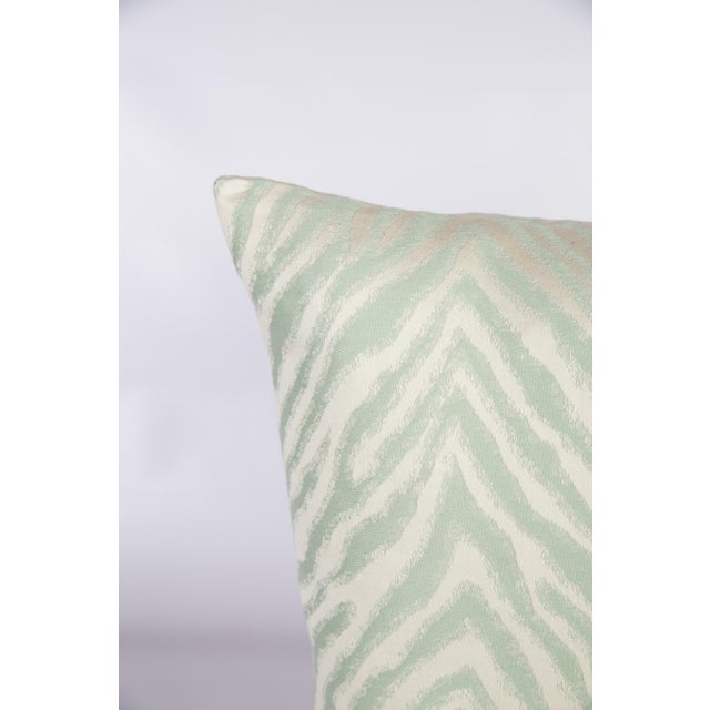 Pair of custom green-and-ivory sateen zebra pattern pillows. Pattern on both sides; knife-edge finish. Hidden zipper...