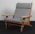 Hans j. Wegner lounge chair with loose cushions new upholstered with grey hallingdal wool from kvadrat. Frame of oak. With...