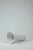 Three cylindrical music boxes gradually open upward, like resonant cavities carved in marble, transforming the gesture of...