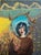 Eye of the Storm by Andrada Trapnell | Mixed media on board Portrait of a girl with blue hair holding flowers. For Sale