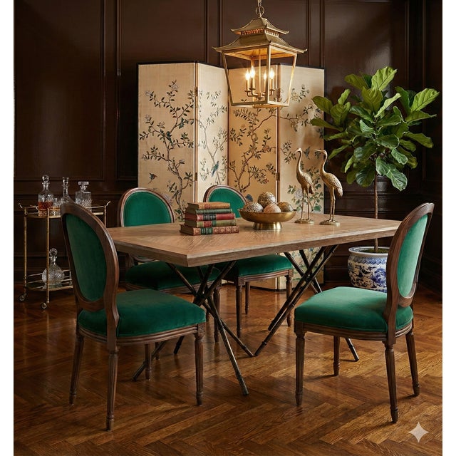 Bridging the gap between organic modernism and Hollywood Regency flair, the "Davenport" dining table by Gabby is a study...