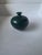 Signed studio pottery vase. Teal to dark green glaze. Glaze is imperfect as designed. Vintage.
