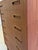 An impressive piece of Danish design for your living space: This tall mid-century teak chest of drawers captivates with...