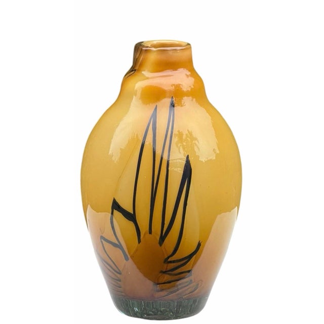 A signed vintage Romanian art glass vase by Mihai Topescu, executed in rich amber cased glass with bold black freeform...