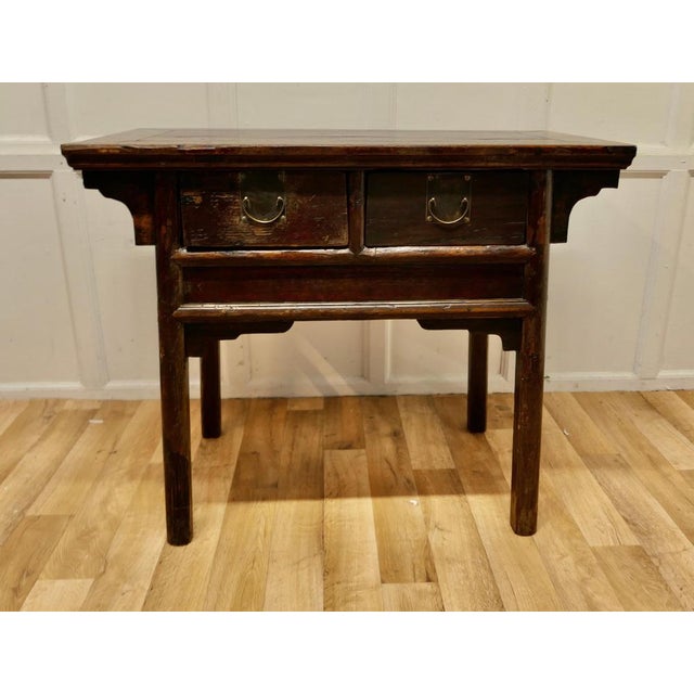 Oriental deep side table or work table This is a very attractive piece, the table has a broad cleated border which has...
