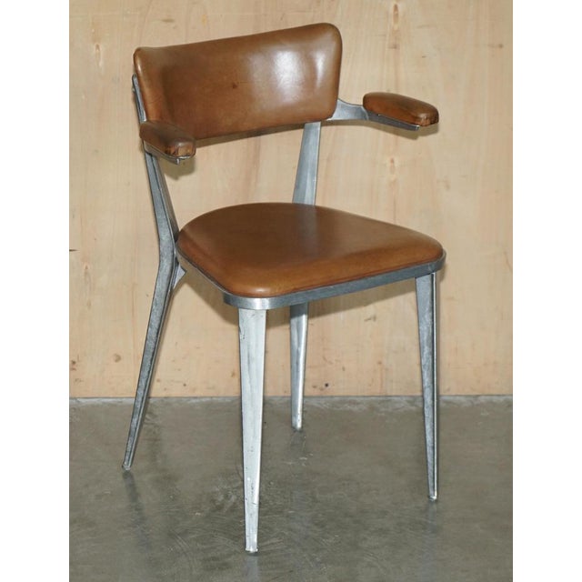 Lovely pair of circa 1950's original ernest race ba3 brown leather upholstered armchairs the ba3 marks ernest race’s debut...