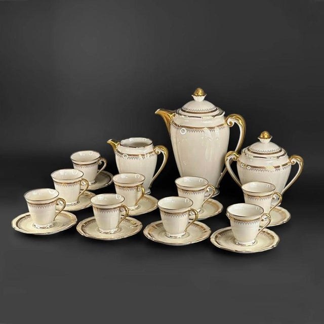 "Coffee Service In Gold Inlay, Limoges Porcelain R.Leclair" Lovely cream and gold Limoges porcelain coffee service. It is...
