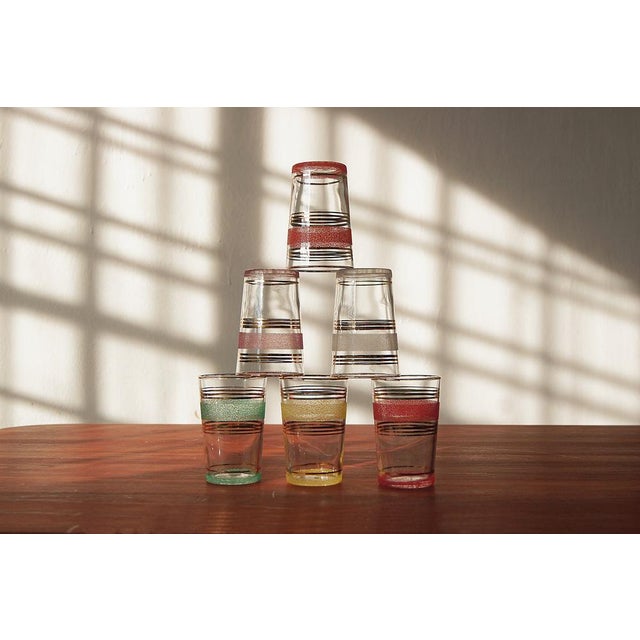 This magnificent set of 6 vintage glasses decorated with gilded and textured matte stripes all vintage items are one of a...