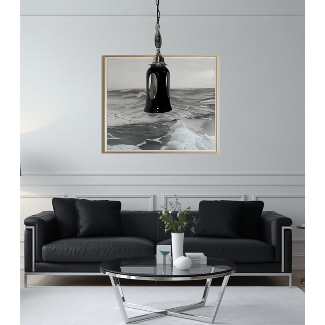 This one‑of‑a‑kind pendant light is a striking fusion of hand‑blown Murano glass, vintage crystal, and polished chrome,...