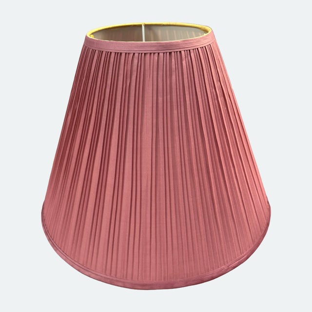 Pair of beautiful vintage pleated lamp shades. Shades are in vintage never-been-used condition and were purchased from an...
