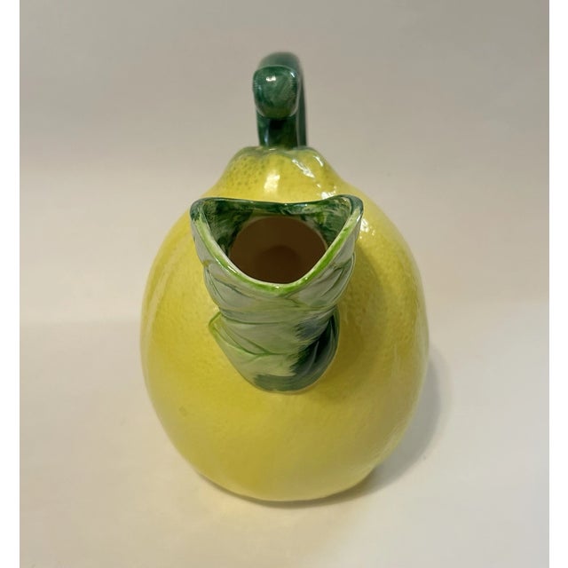 Bring a fresh, cheerful touch to your kitchen with this charming **Vintage The Haldon Group Ceramic Lemon Fruit Pitcher**....