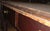 Antique Stately Primitive Mexican-Style Secretarial Writing Table - Carved Solid Wood Desk With Historied Weathering For Sale - Image 12 of 14