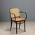 Vintage Thonet-style chair with stained beech wood frame, seat and backrest in Vienna straw. This piece is attributed to...