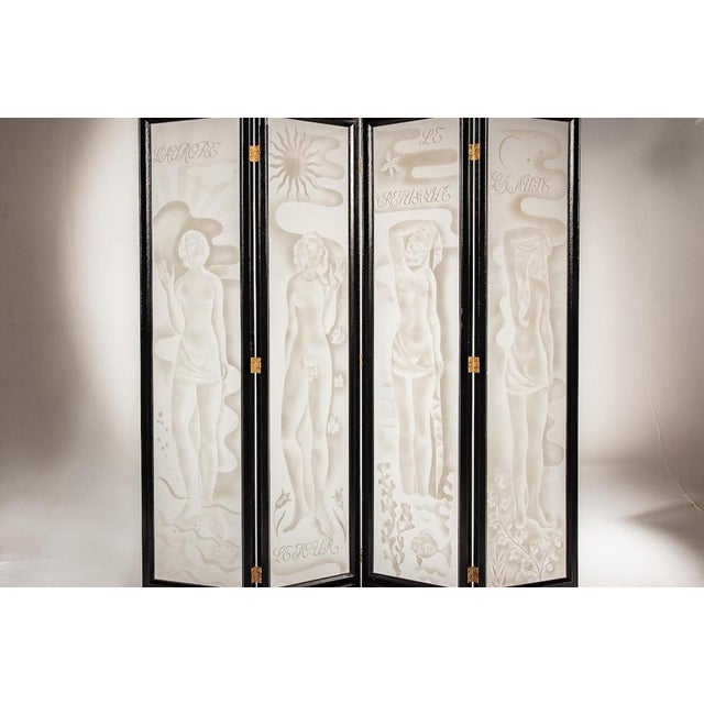 An exceptionally rare folding screen with sandblasted-glass panels depicting dawn, day, dusk and night, signed by Marie...
