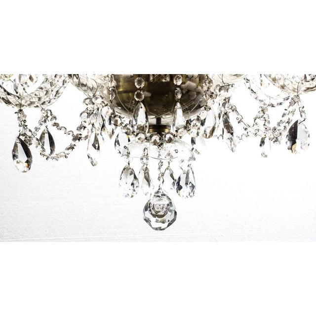 This is a beautiful vintage Venetian style two-tier crystal chandelier with 12 lights and beautiful clear crystal drops,...