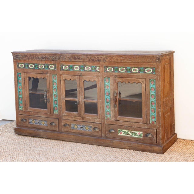 This antique Indo Portuguese sideboard, is a rare and expansive 80-inch sideboard that serves as a bridge between European...