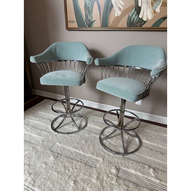 Vintage 1970s Tulip Style Chrome Swivel Bar Stools Gorgeous set of two chrome swivel bar stools with tulip style bases....